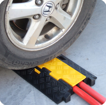 Car moving above channel protector